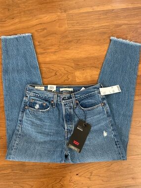 Levi's Women's Light Blue High-Rise Straight Jeans with Frayed Hem